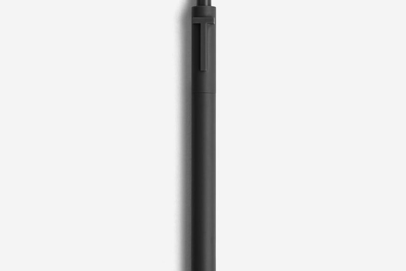 Machined metal everyday carry pen on a notebook